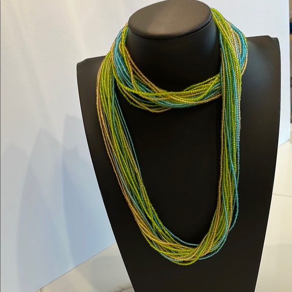 Jewelry - Multicolor Beaded Necklace. 17 strands measuring 34”. So many ways to style it.